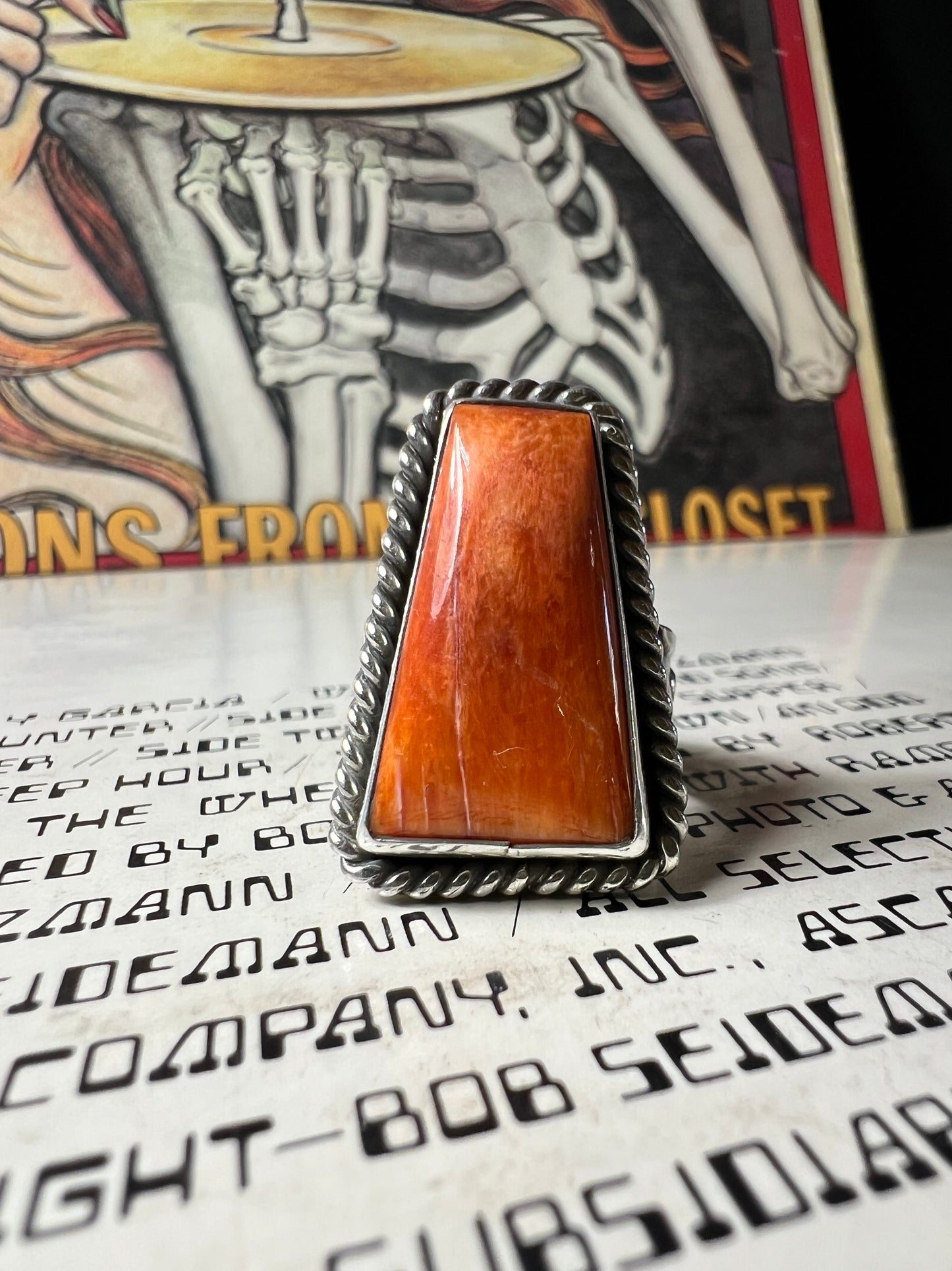 Orange spiny stamped ring