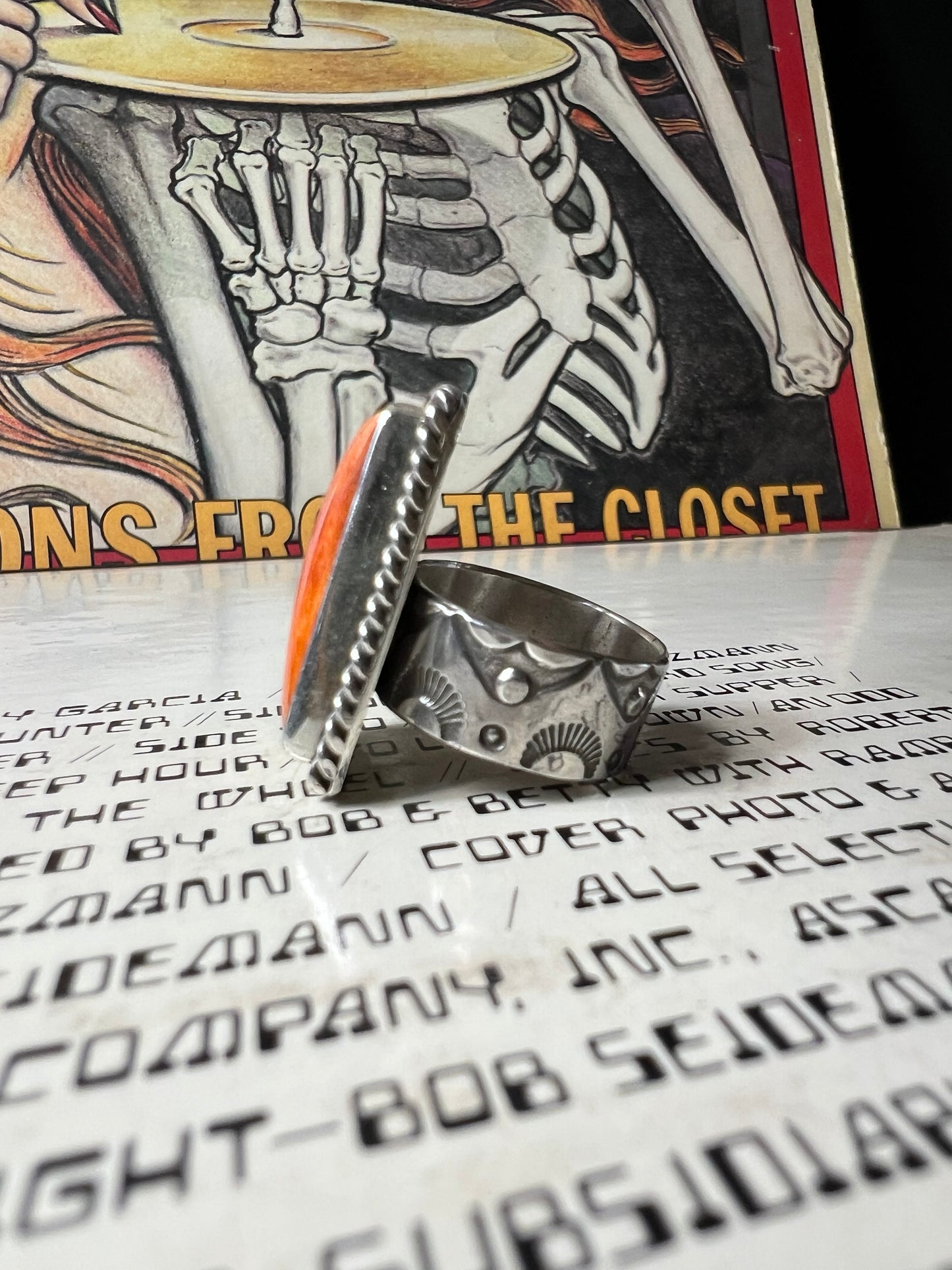 Orange spiny stamped ring